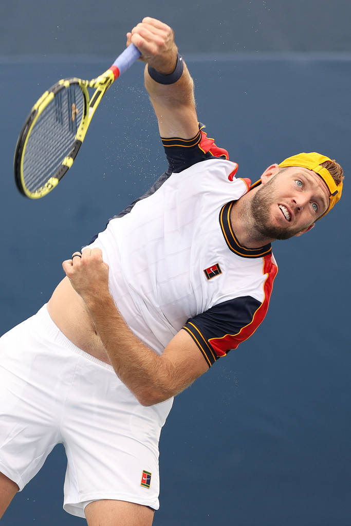 Jack Sock With Tennis Racket Background