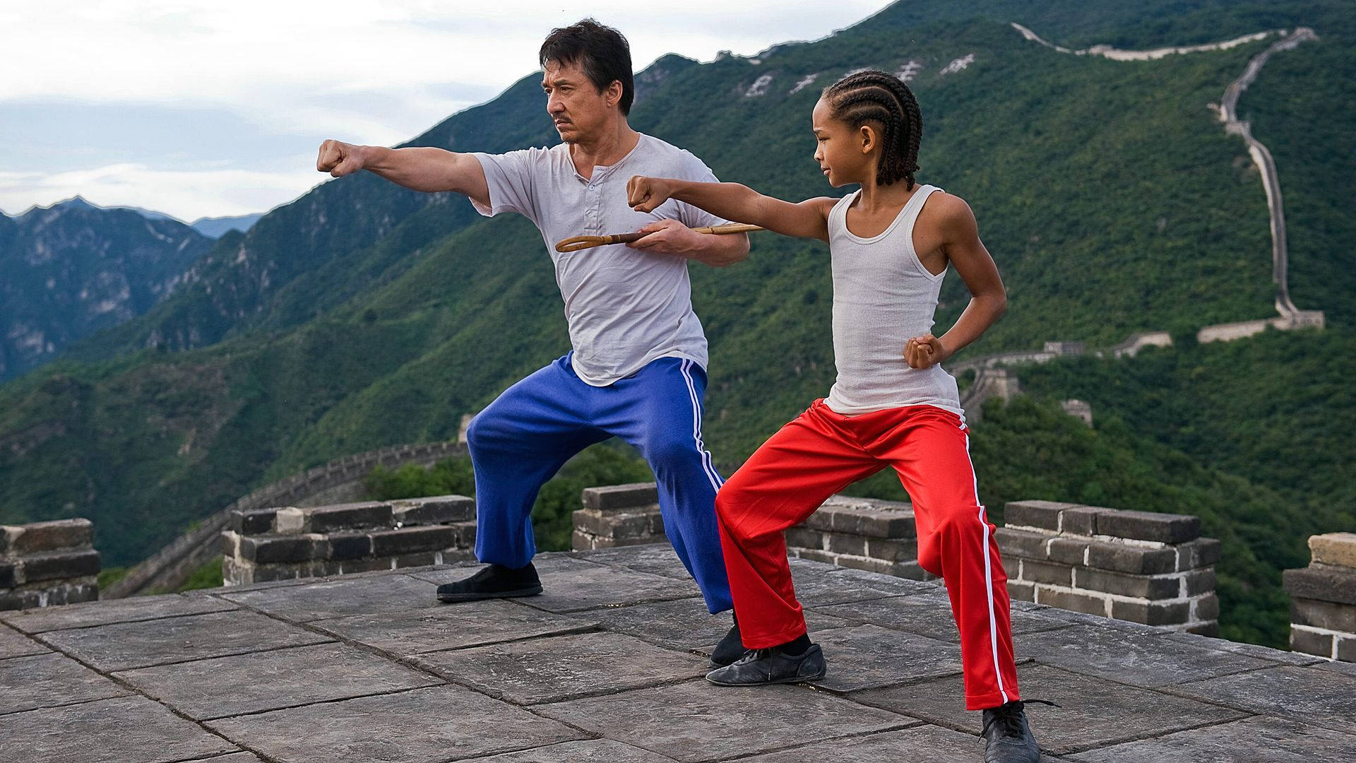 Jackie Chan Demonstrating Karate Techniques Background