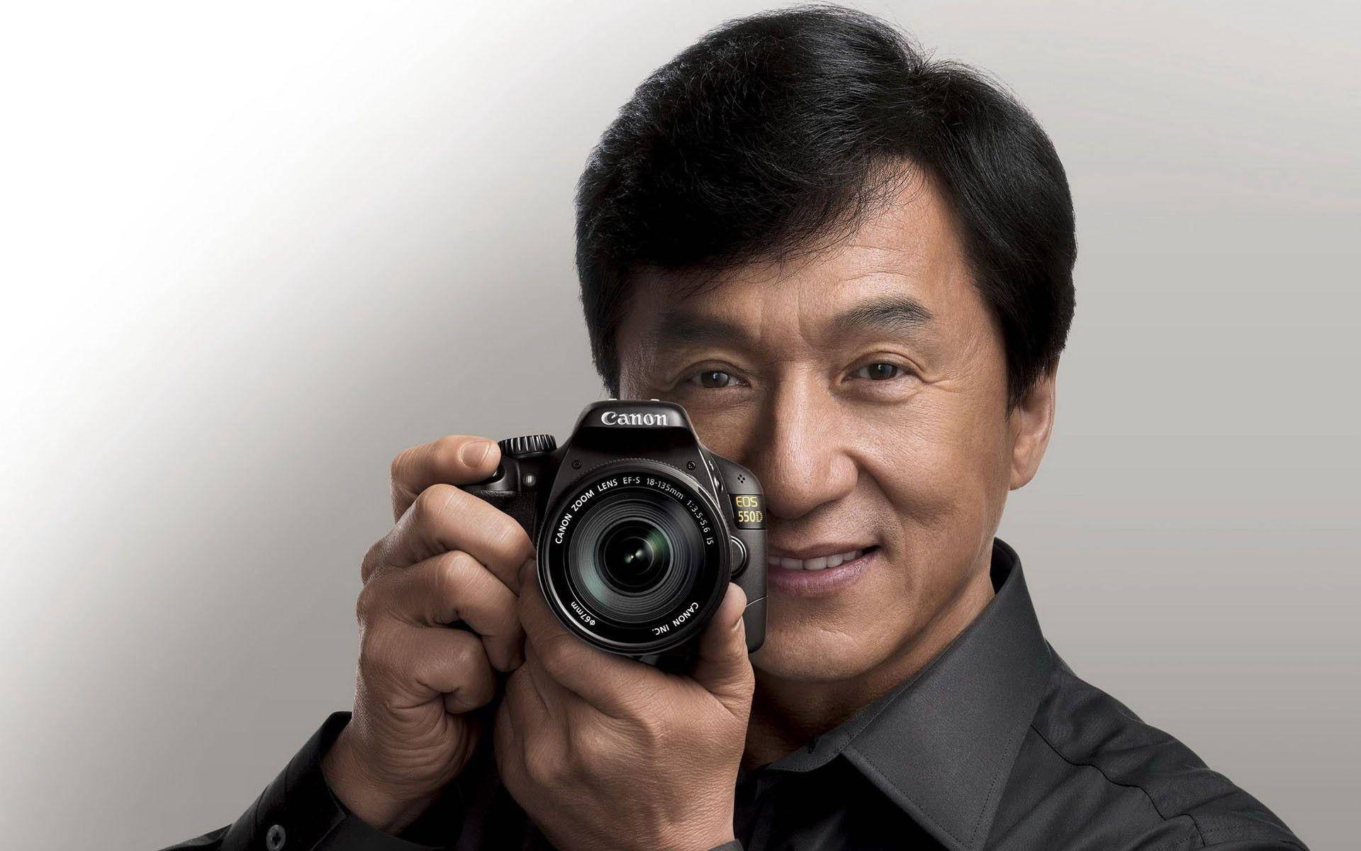 Jackie Chan In Action With Camera Background