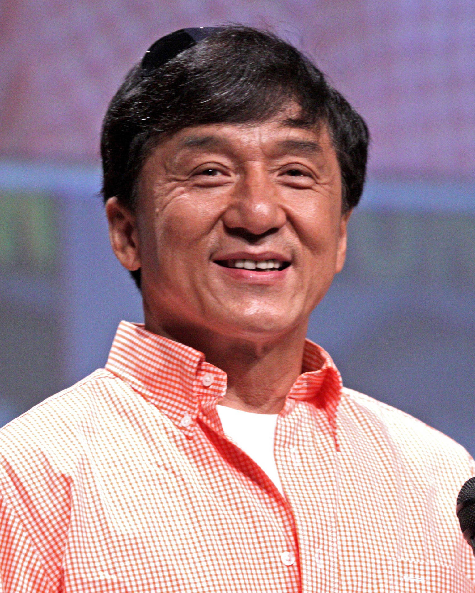 Jackie Chan In Pink Polo