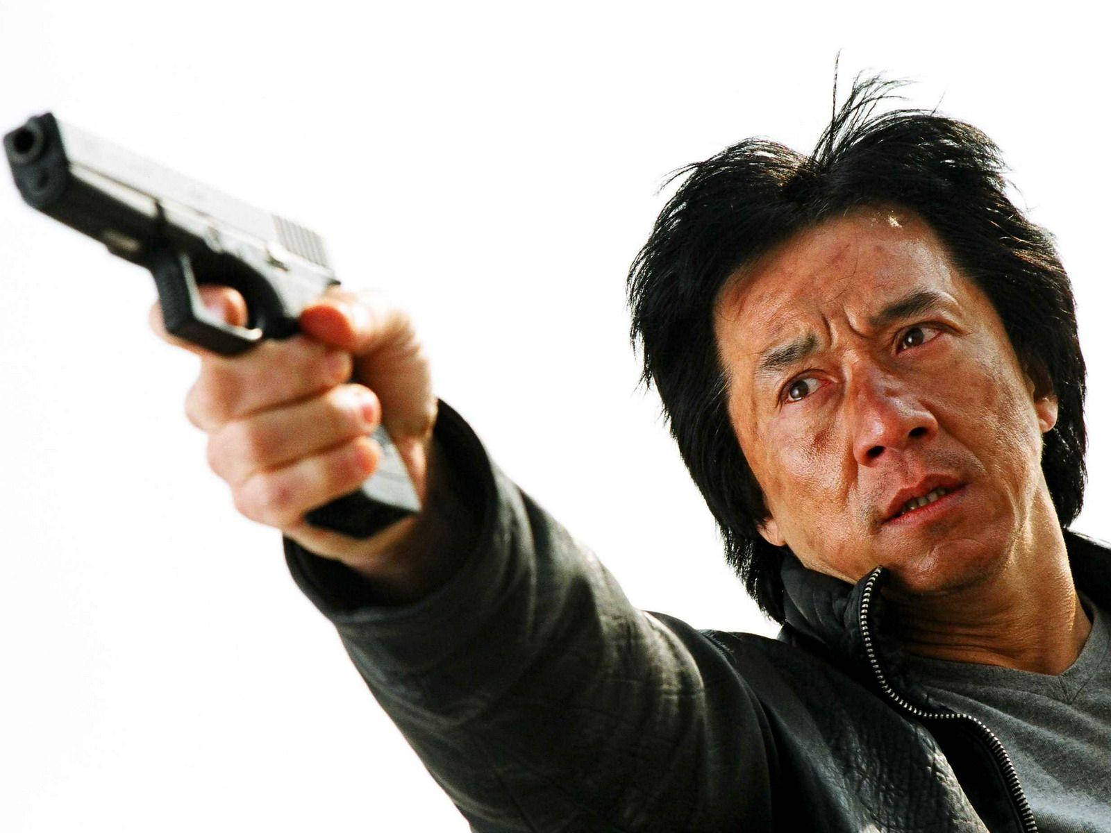 Jackie Chan With A Gun Background