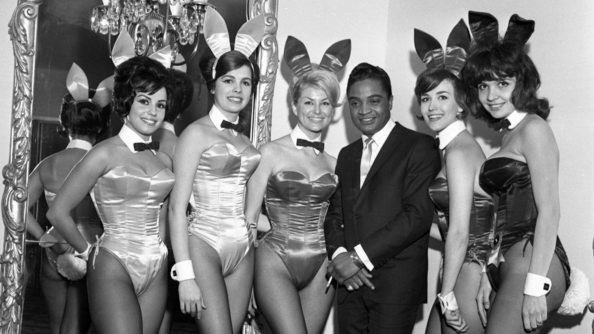 Jackie Wilson - Legendary American Singer Posing With Playboy Bunnies Background