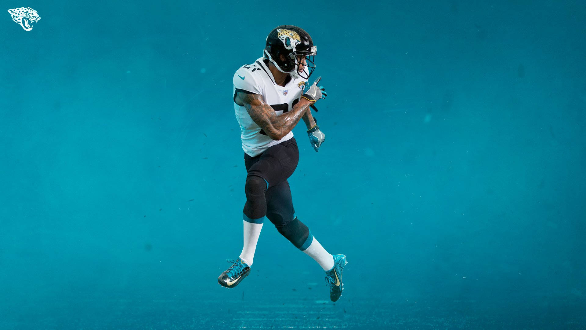 Jacksonville Jaguars Player In White Jersey Background