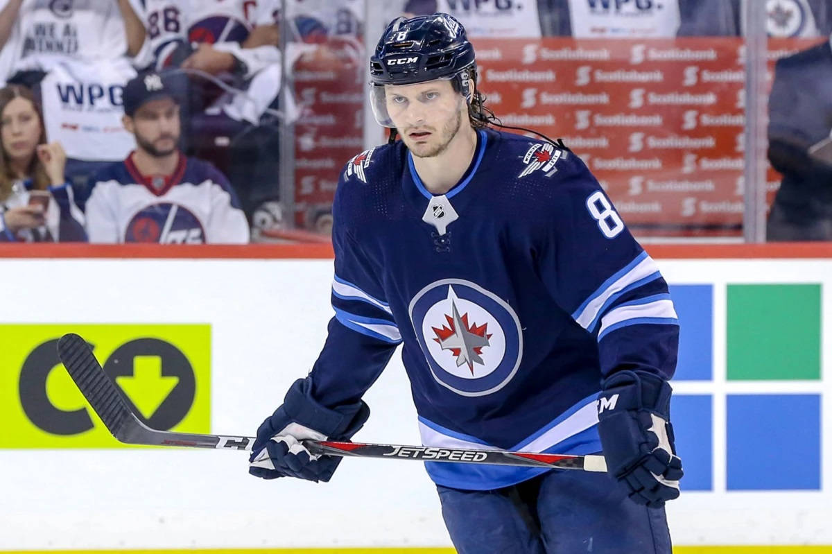 Jacob Trouba Fierce Expression While Focusing On The Game Background