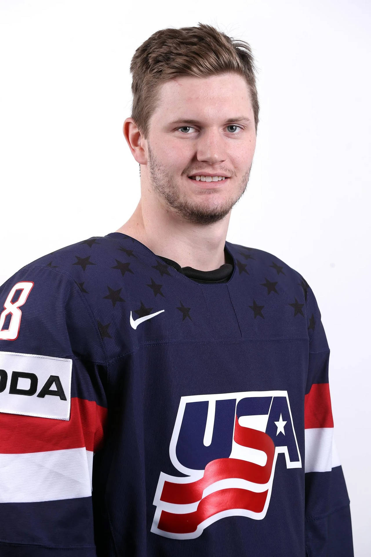 Jacob Trouba Smiling For Usa Iihf Championship Background