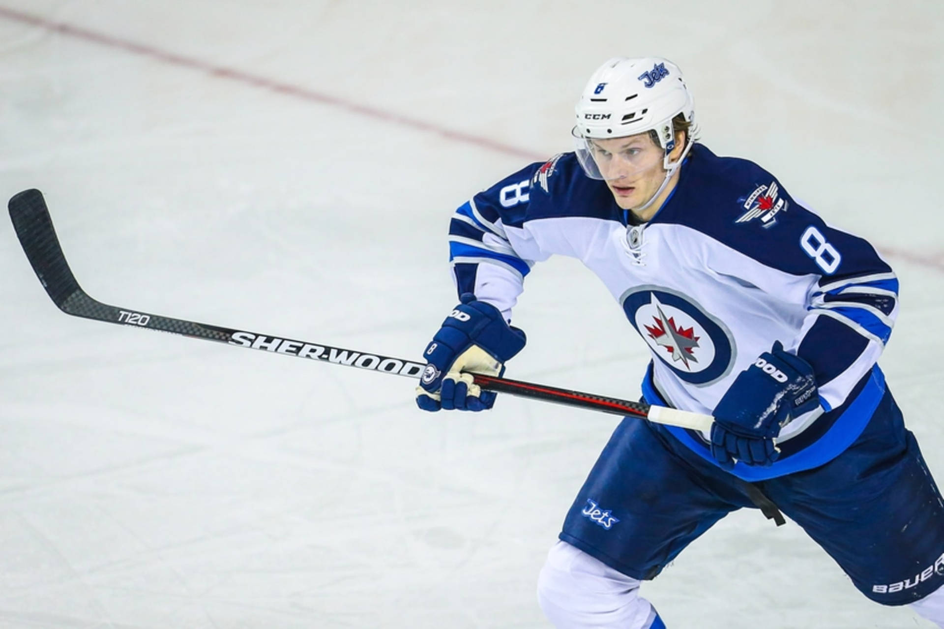 Jacob Trouba Surprised Expression With Raised Hockey Stick Background