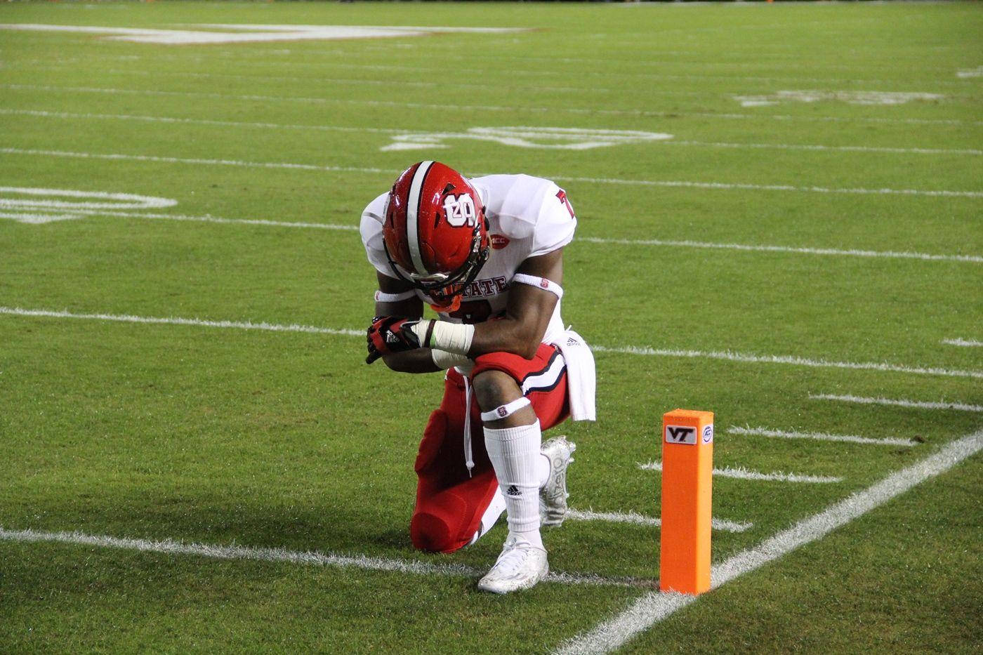 Jacoby Brissett Kneels Background