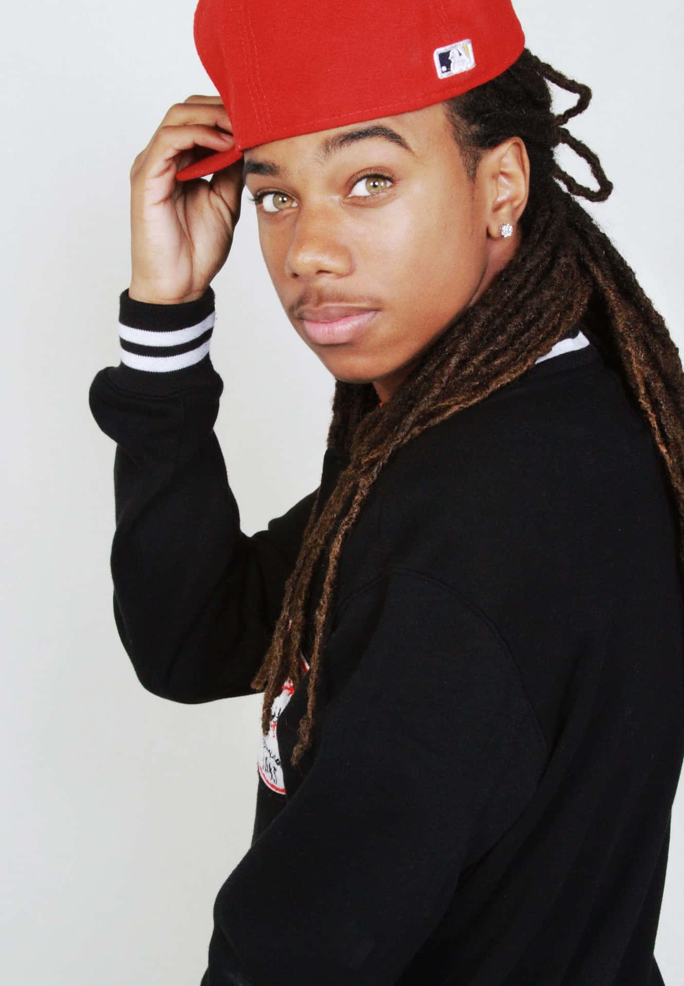 Jacquees Red Cap Photoshoot Background