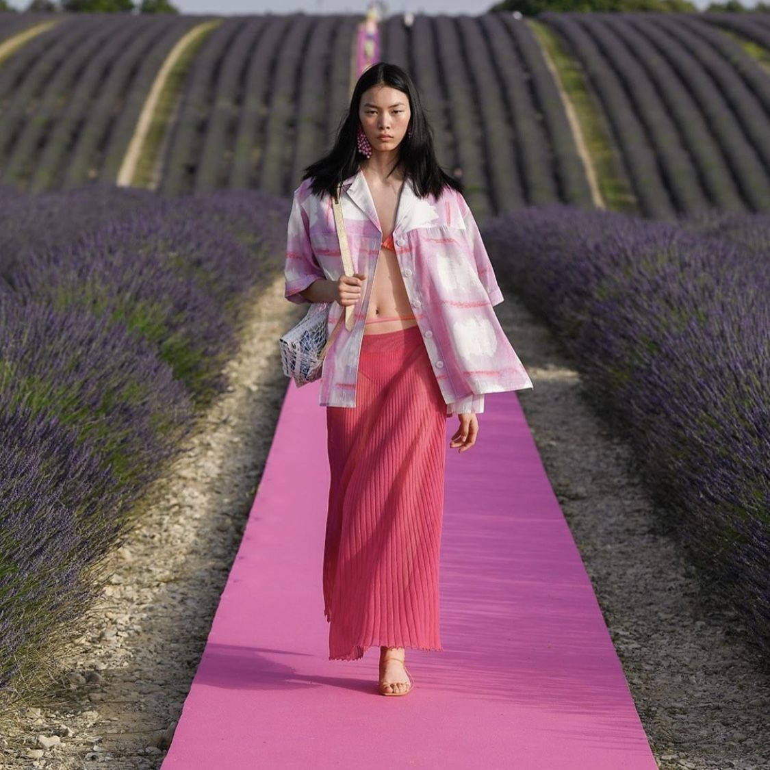 Jacquemus Model In Pink Catwalk Background