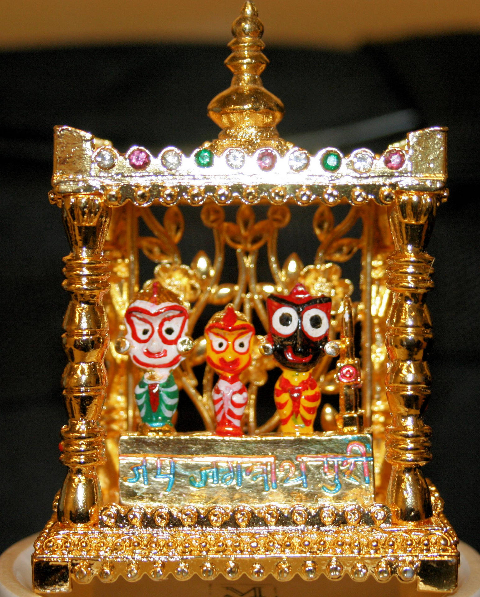 Jagannath Gold Figurine Background