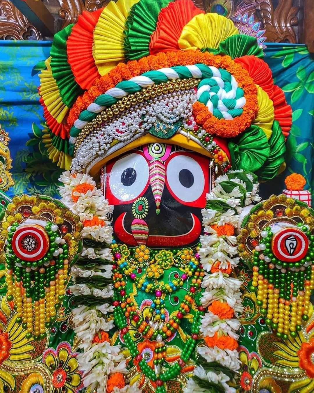 Jagannath Wearing Colourful Headdress Background