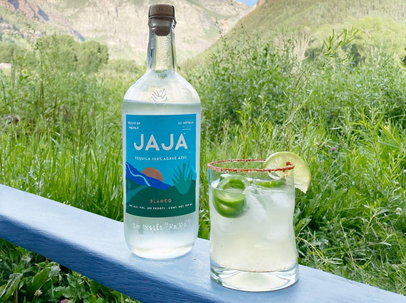 Jaja Tequila At Grass Field Background