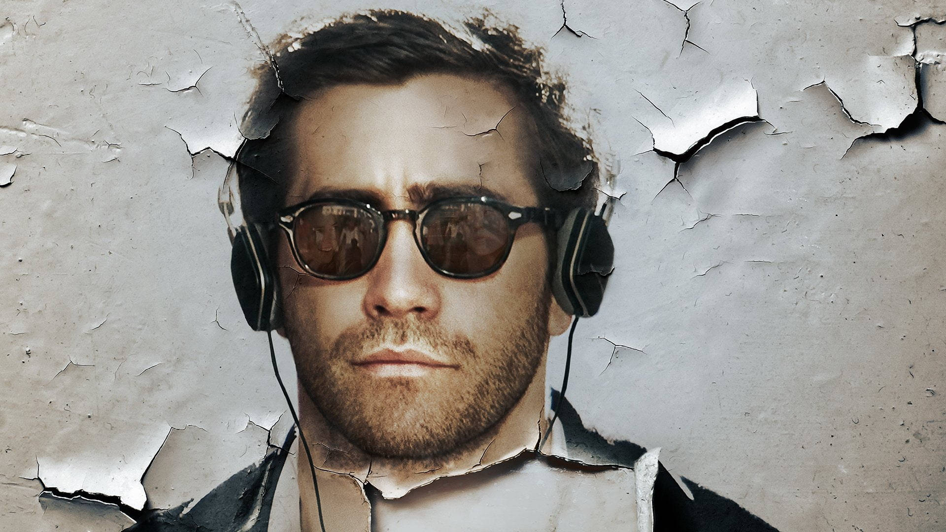 Jake Gyllenhaal With Headphones Background