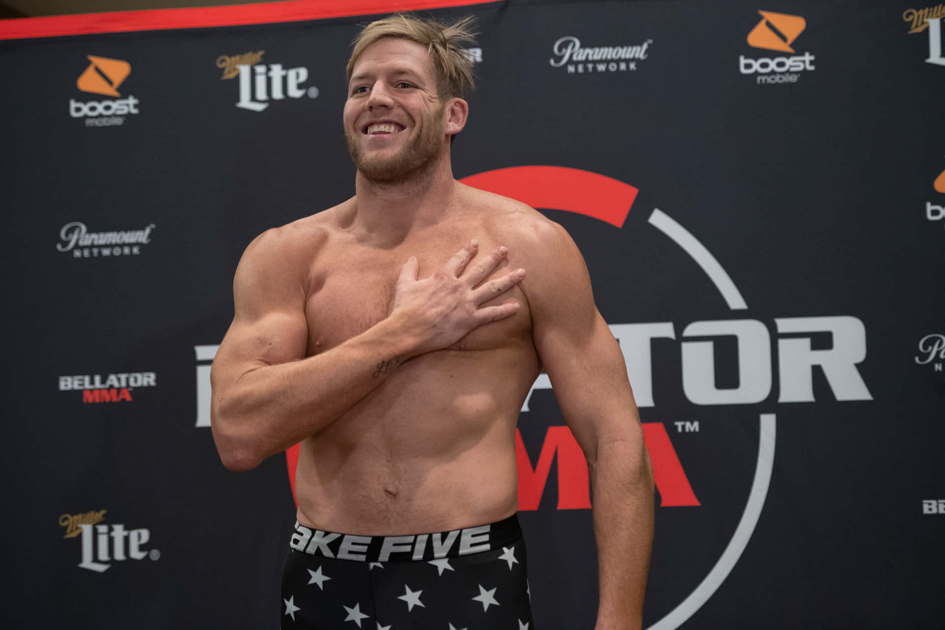 Jake Hager Celebrating His Triumphant Second Victory At Bellator 221. Background