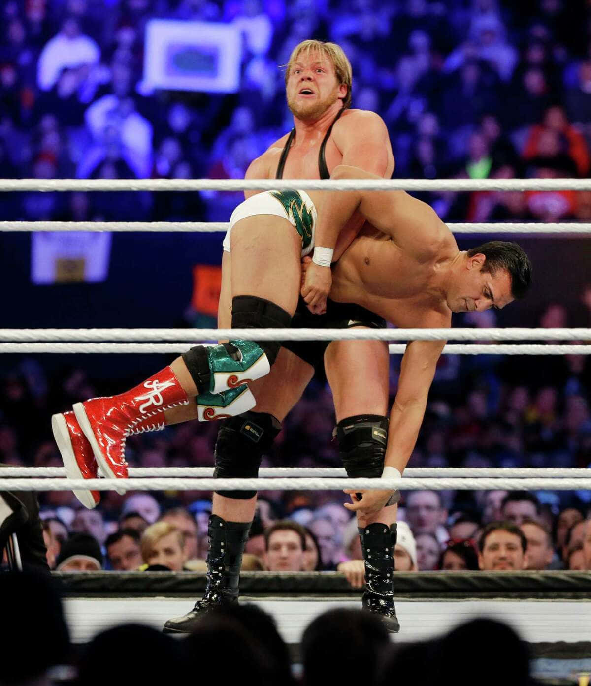 Jake Hager In An Intense Face-off With Alberto Del Rio Background