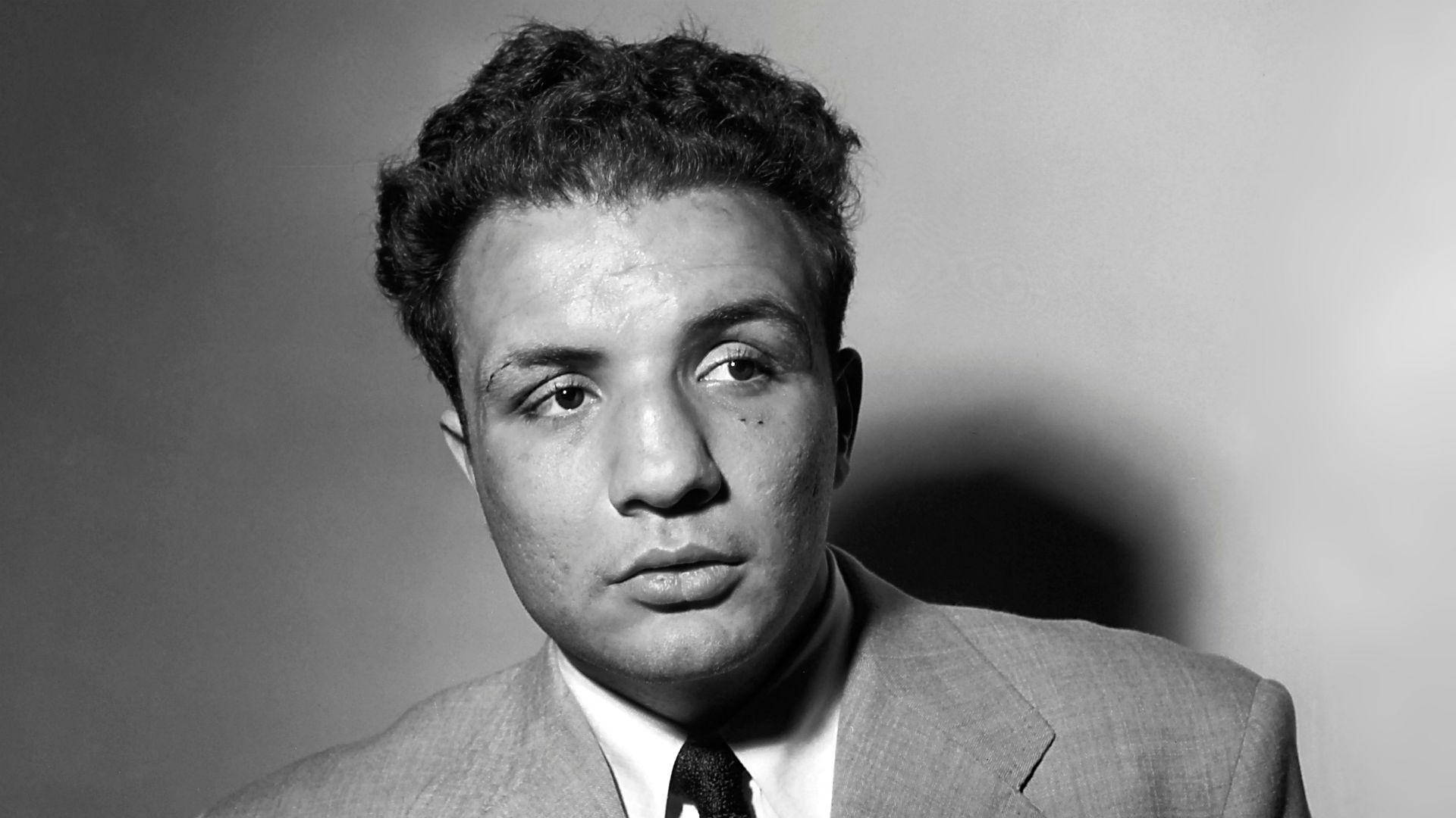 Jake Lamotta In A Suit And Tie Outfit