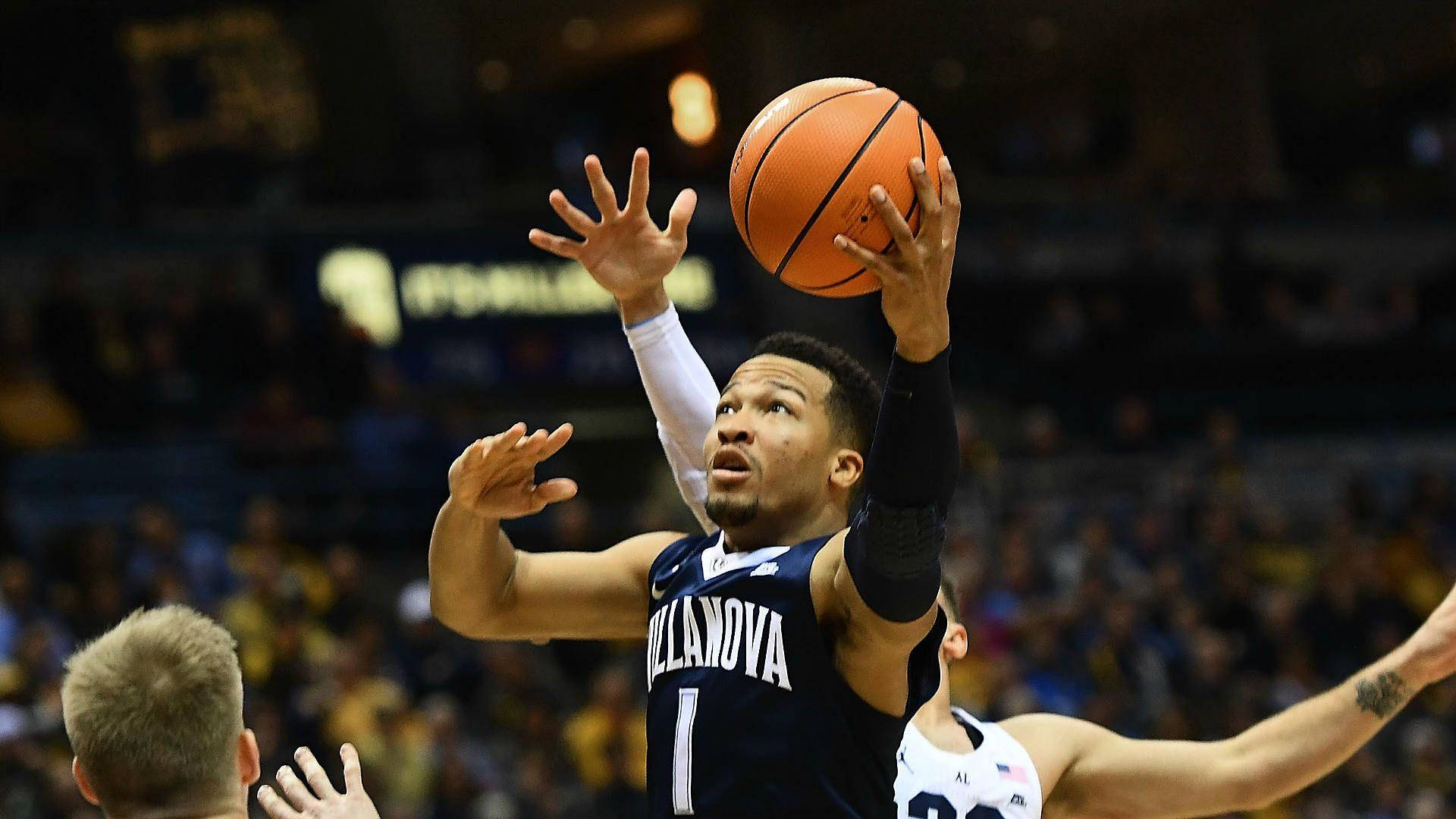 Jalen Brunson Driving To The Basket Background