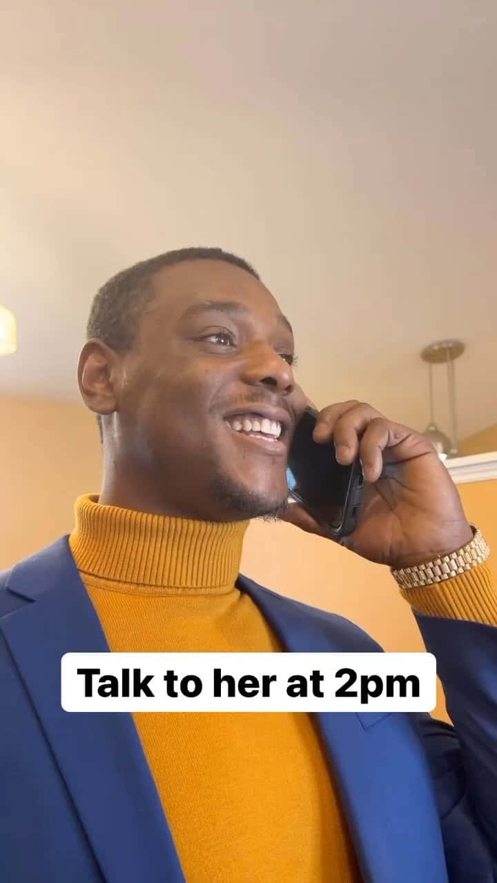 Jamahal Hill In Turtleneck And Coat
