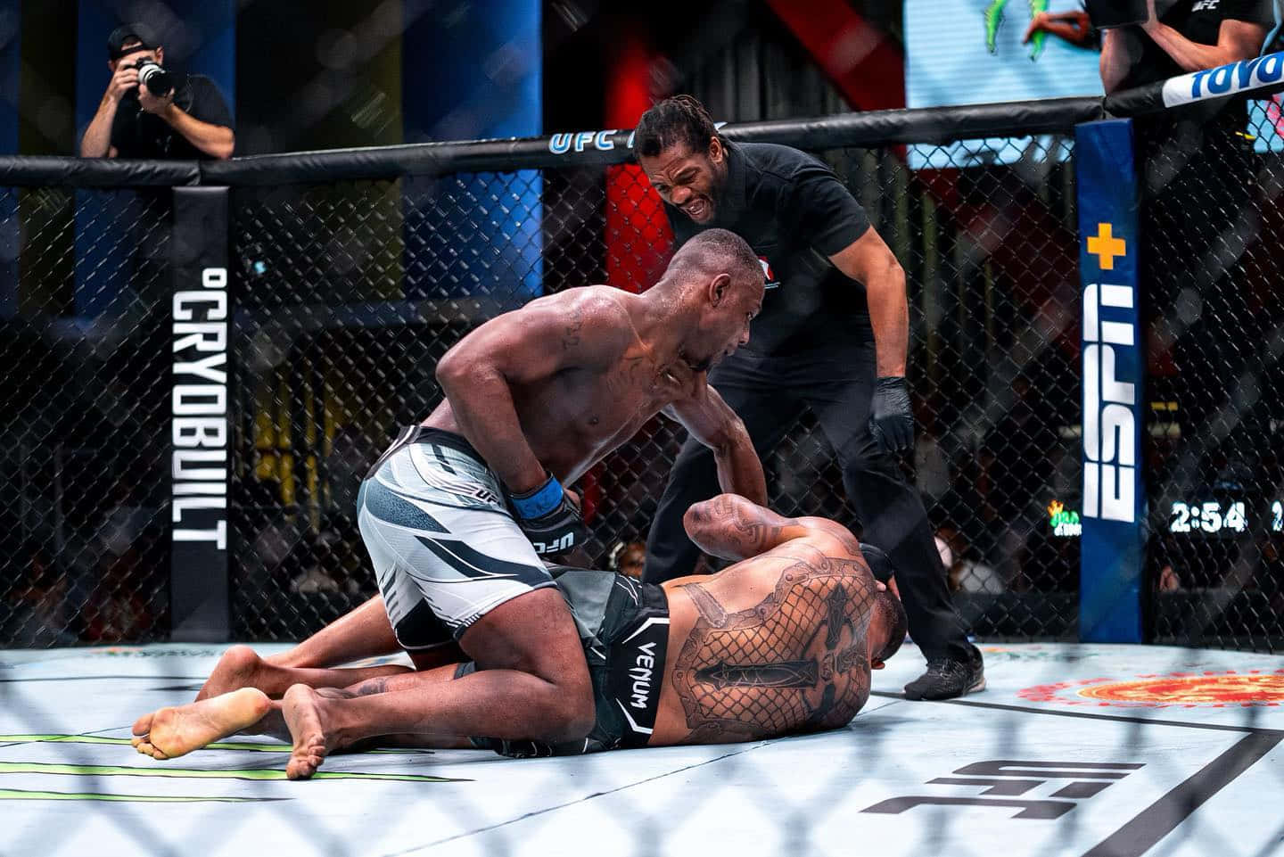 Jamahal Hill Punching Thiago Santos Background
