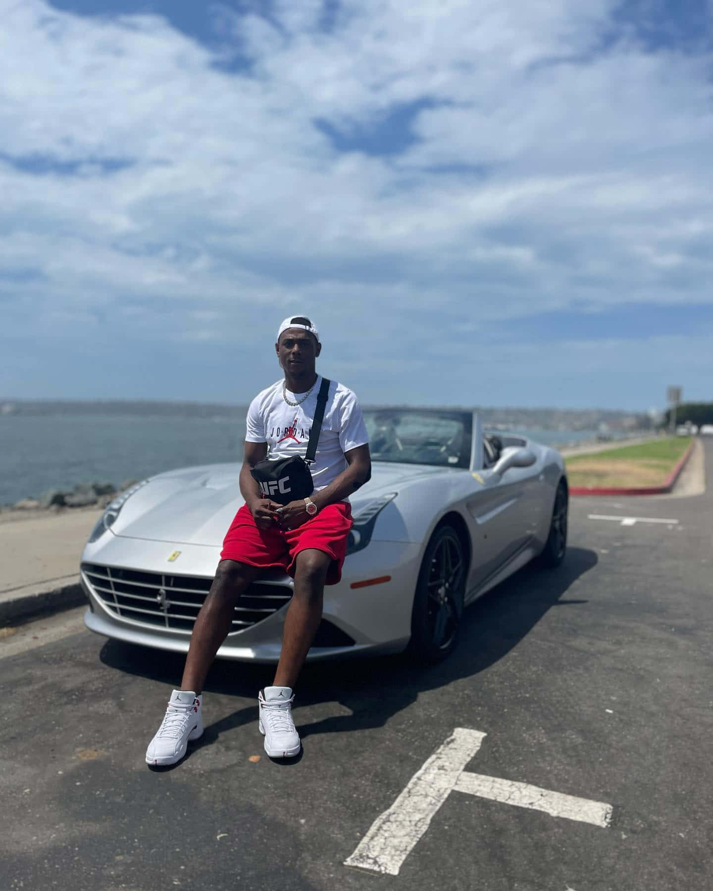 Jamahal Hill Sitting On Hood Of Ferrari