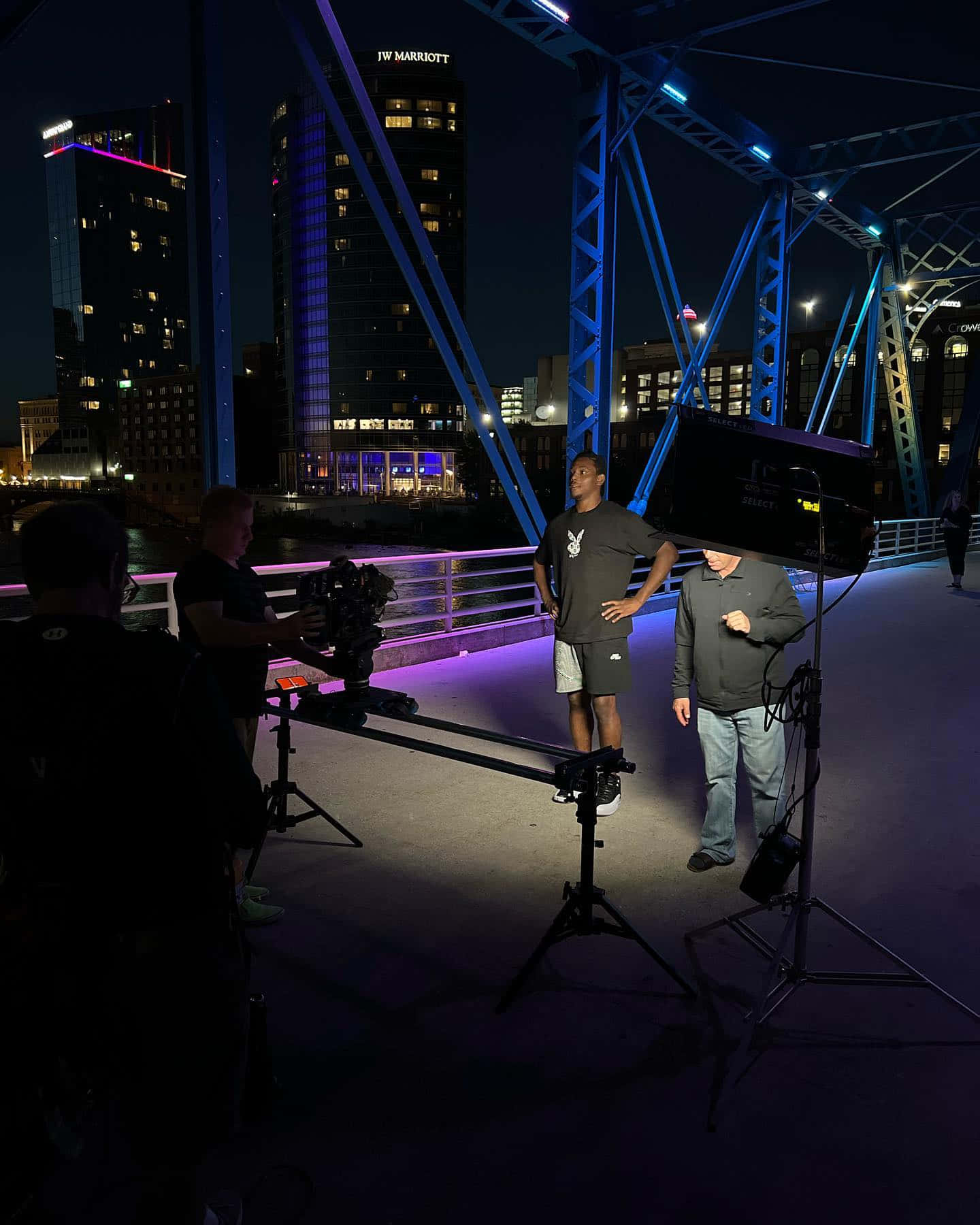 Jamahal Hill With Cameras And Lights Background