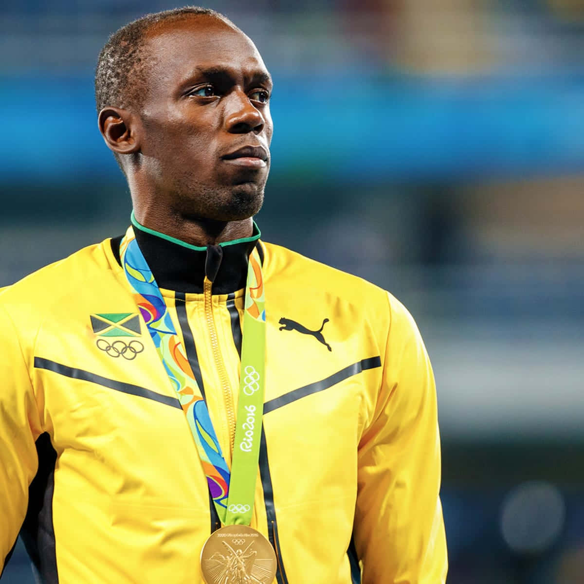 Jamaican Athlete Usain Bolt Looking Determined Background