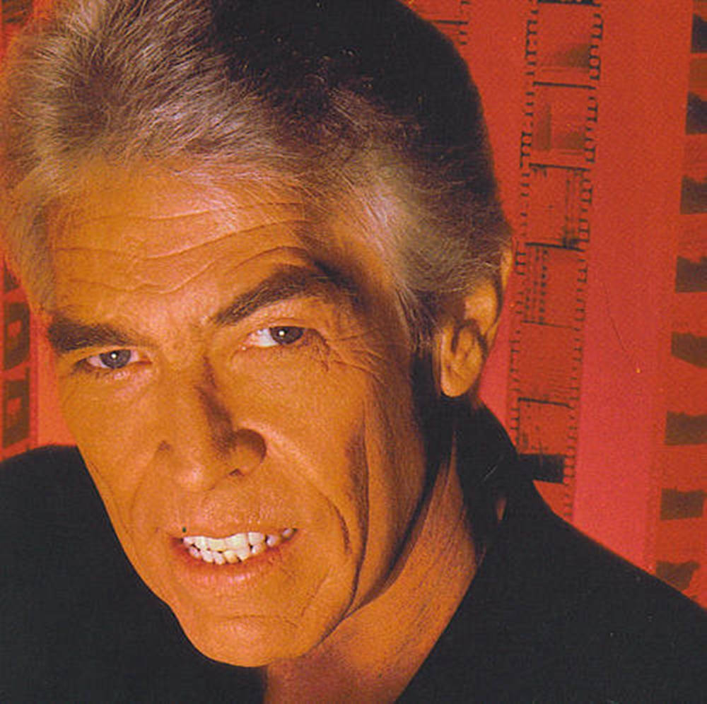 James Coburn Red Background