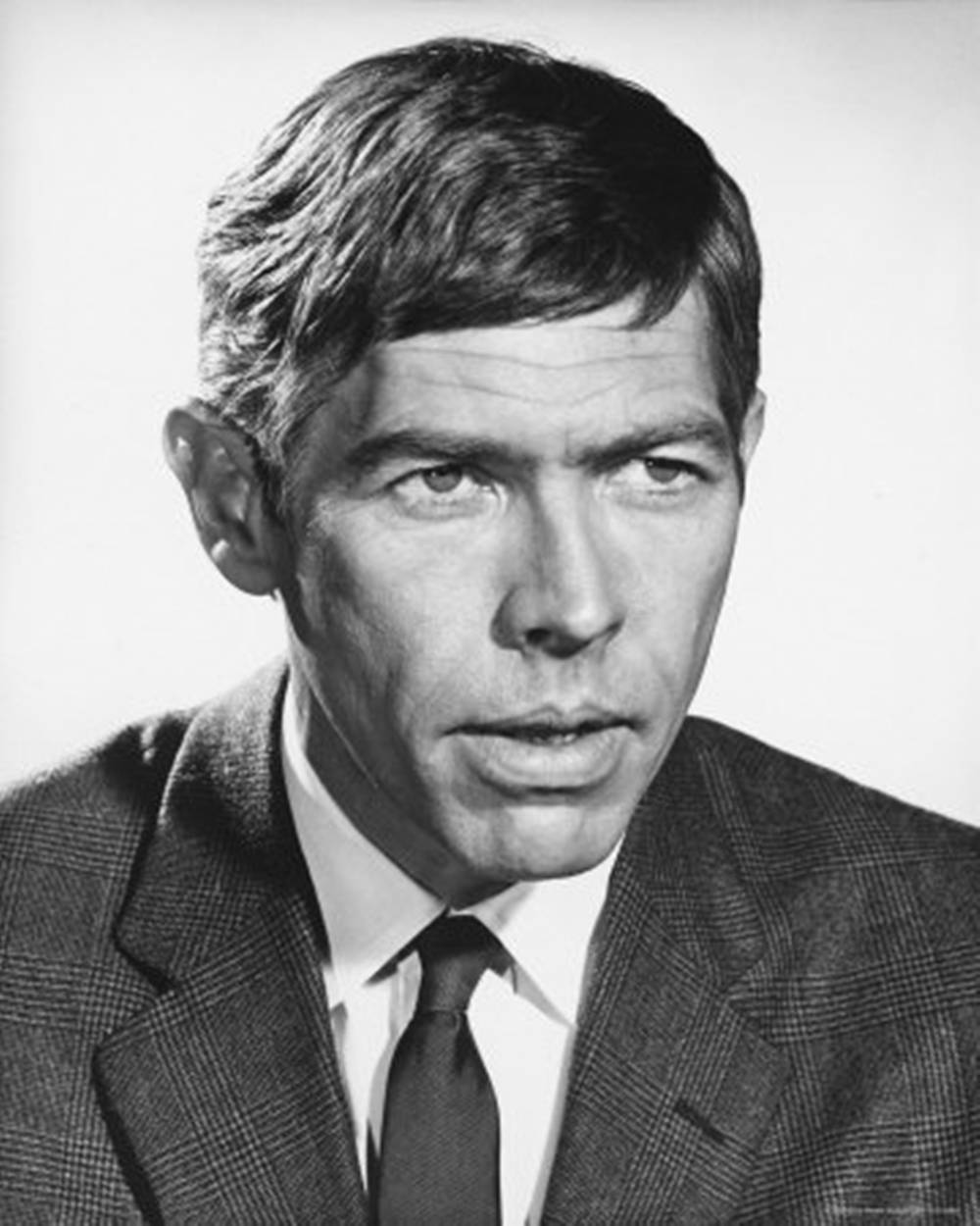 James Coburn Serious Stare Background