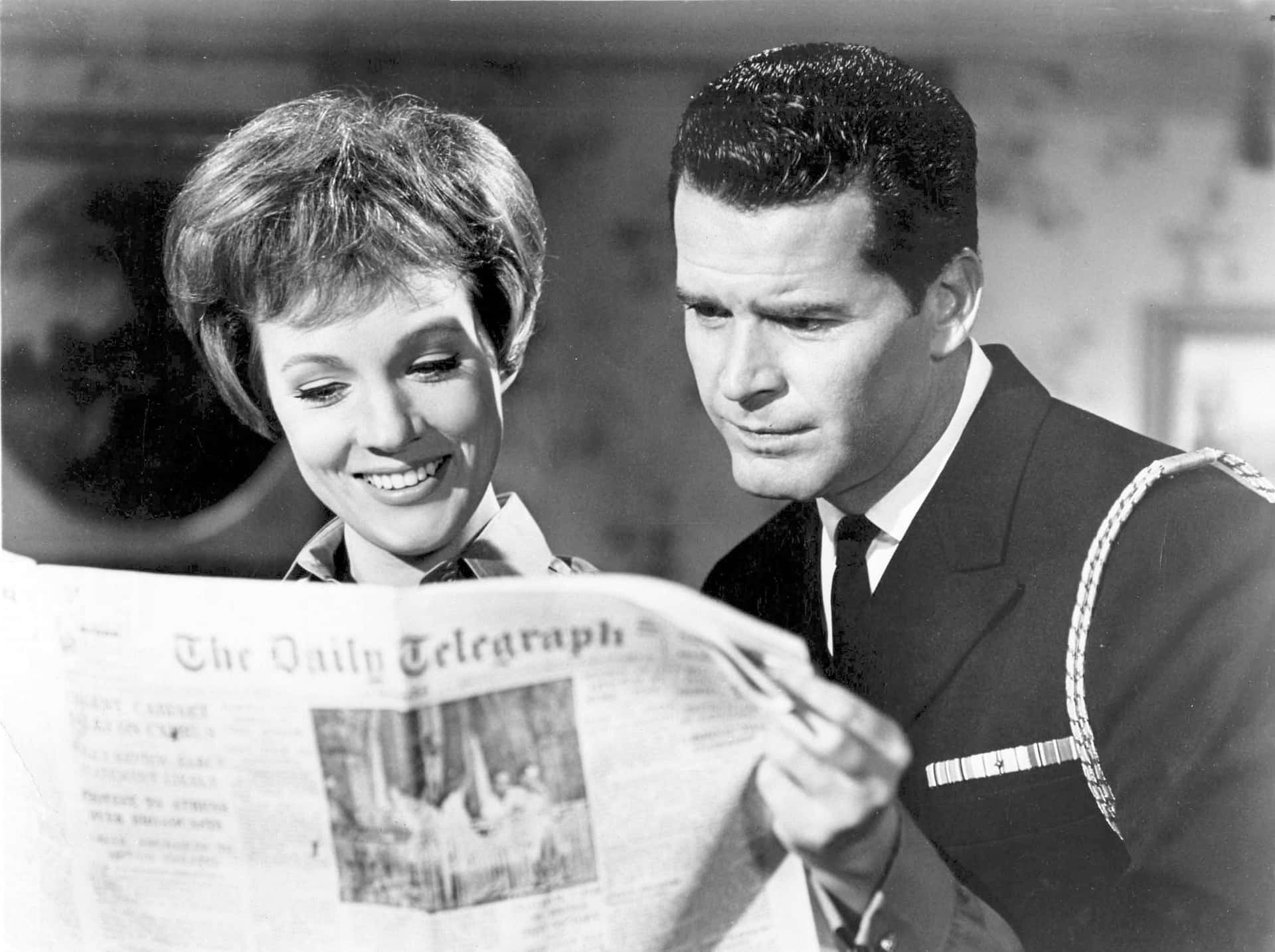 James Garner Reading Newspaper With Co Star Background