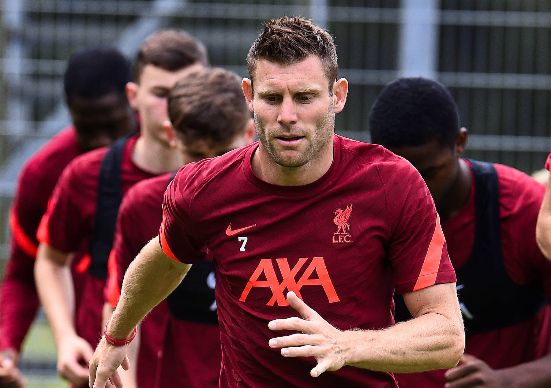 James Milner With Lfc Teammates Background