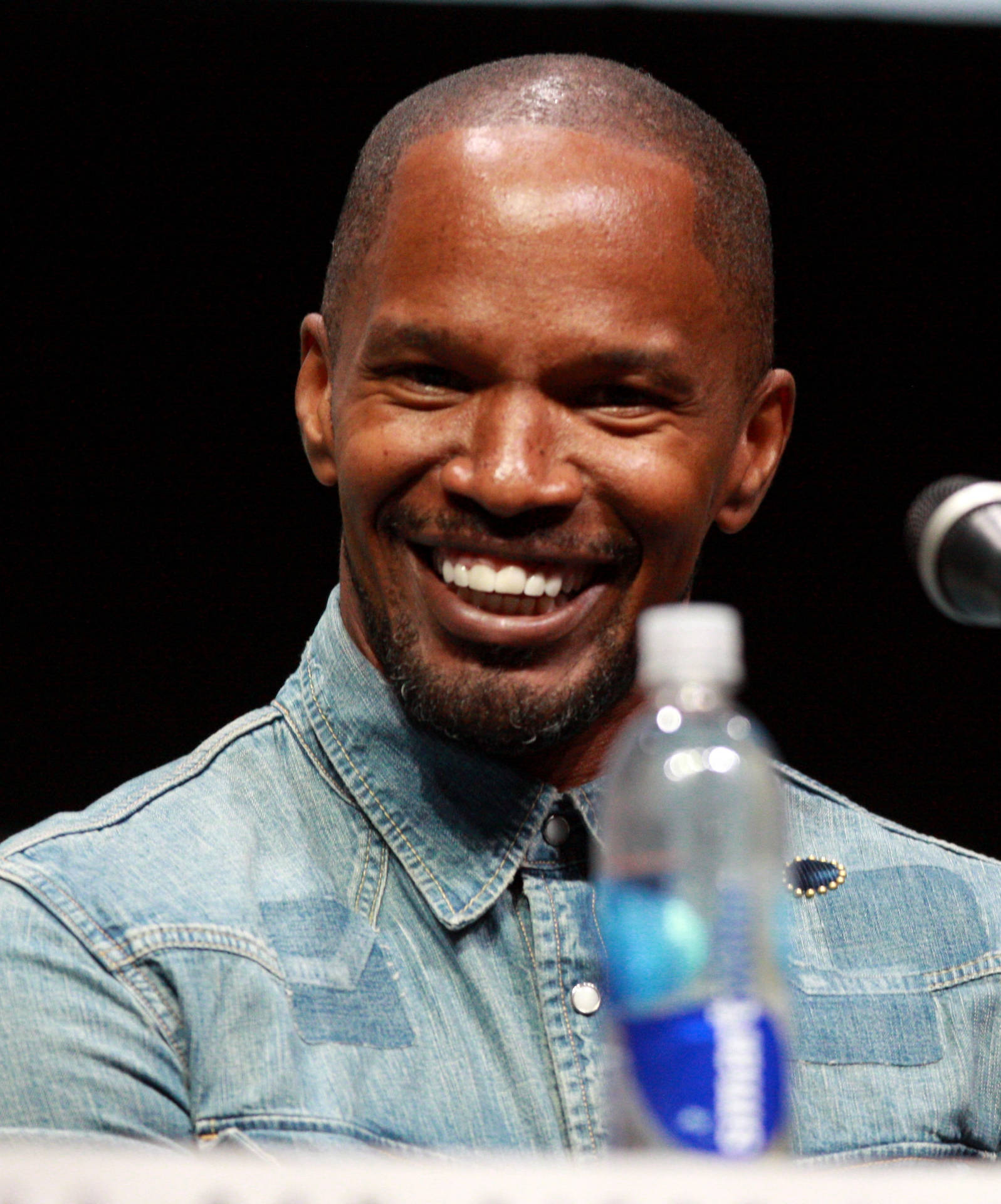 Jamie Foxx Grins Happily While Attending The Golden Globe Awards. Background