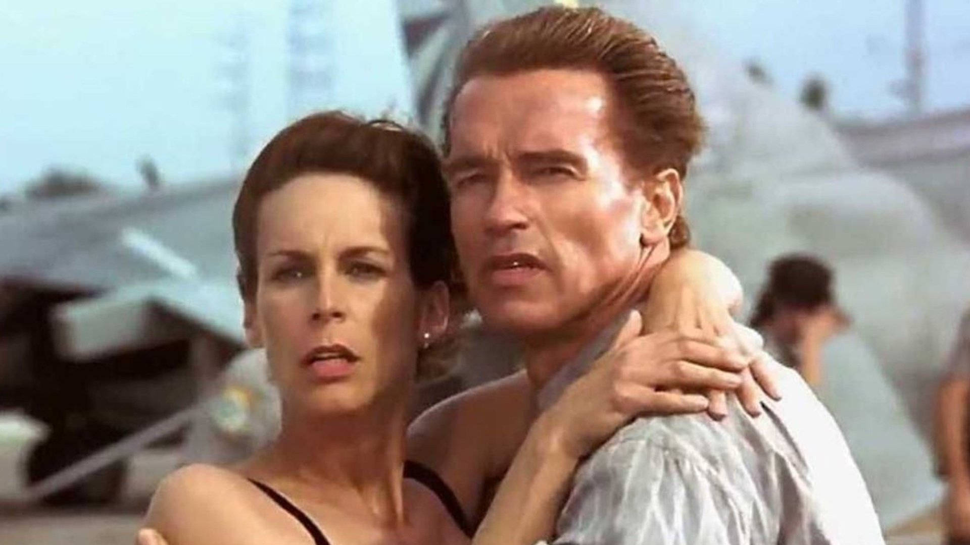 Jamie Lee Curtis And Arnold Schwarzenegger Background