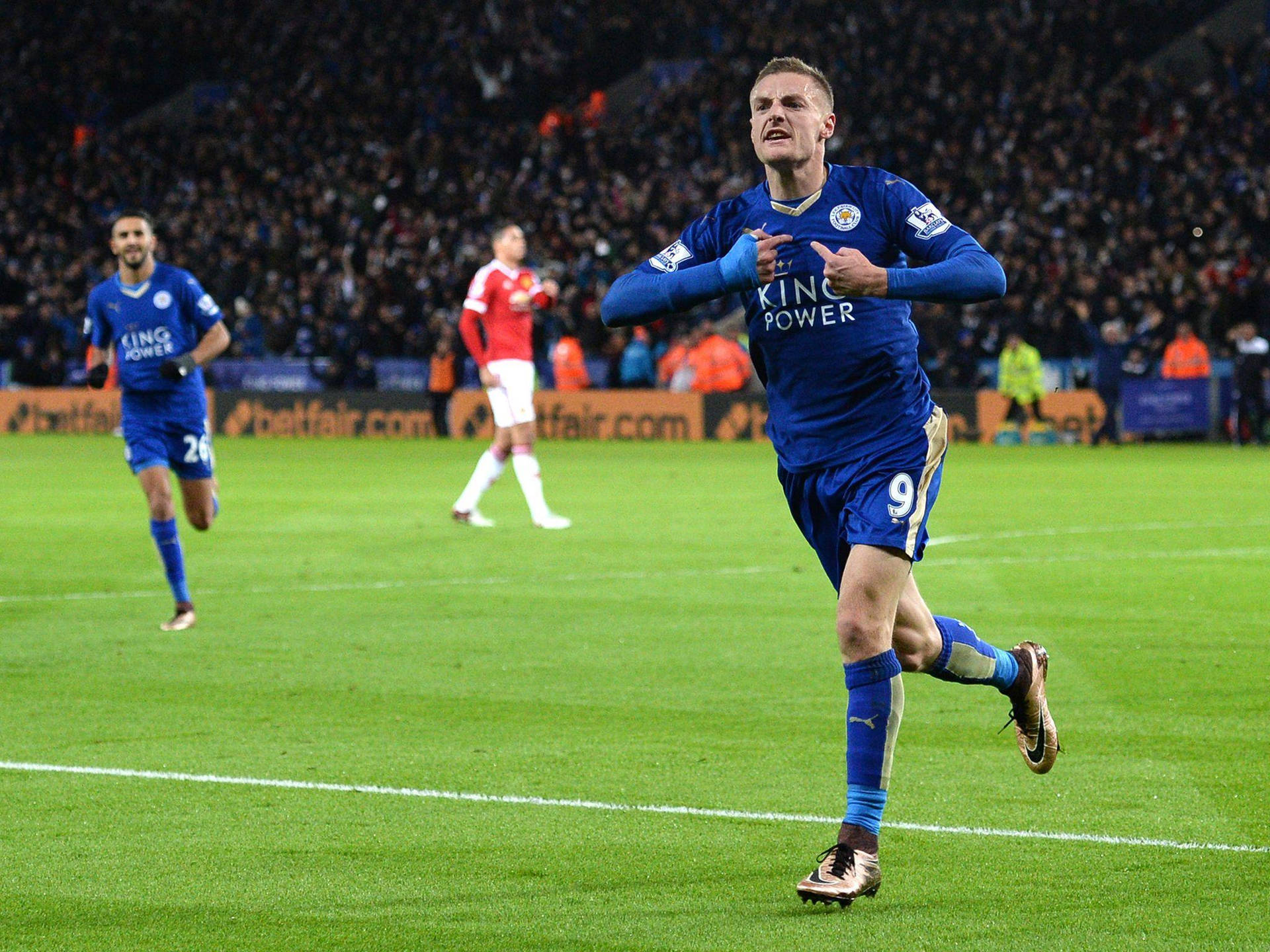 Jamie Vardy Pointing At Chest Background