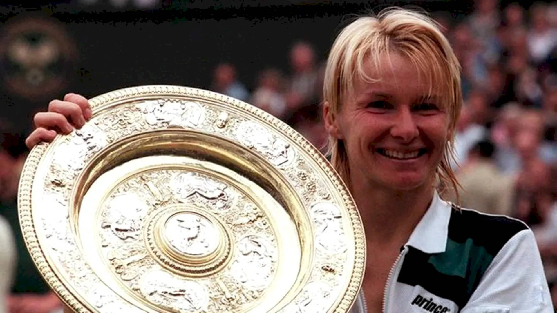 Jana Novotna Holding Her Championship Trophy Background