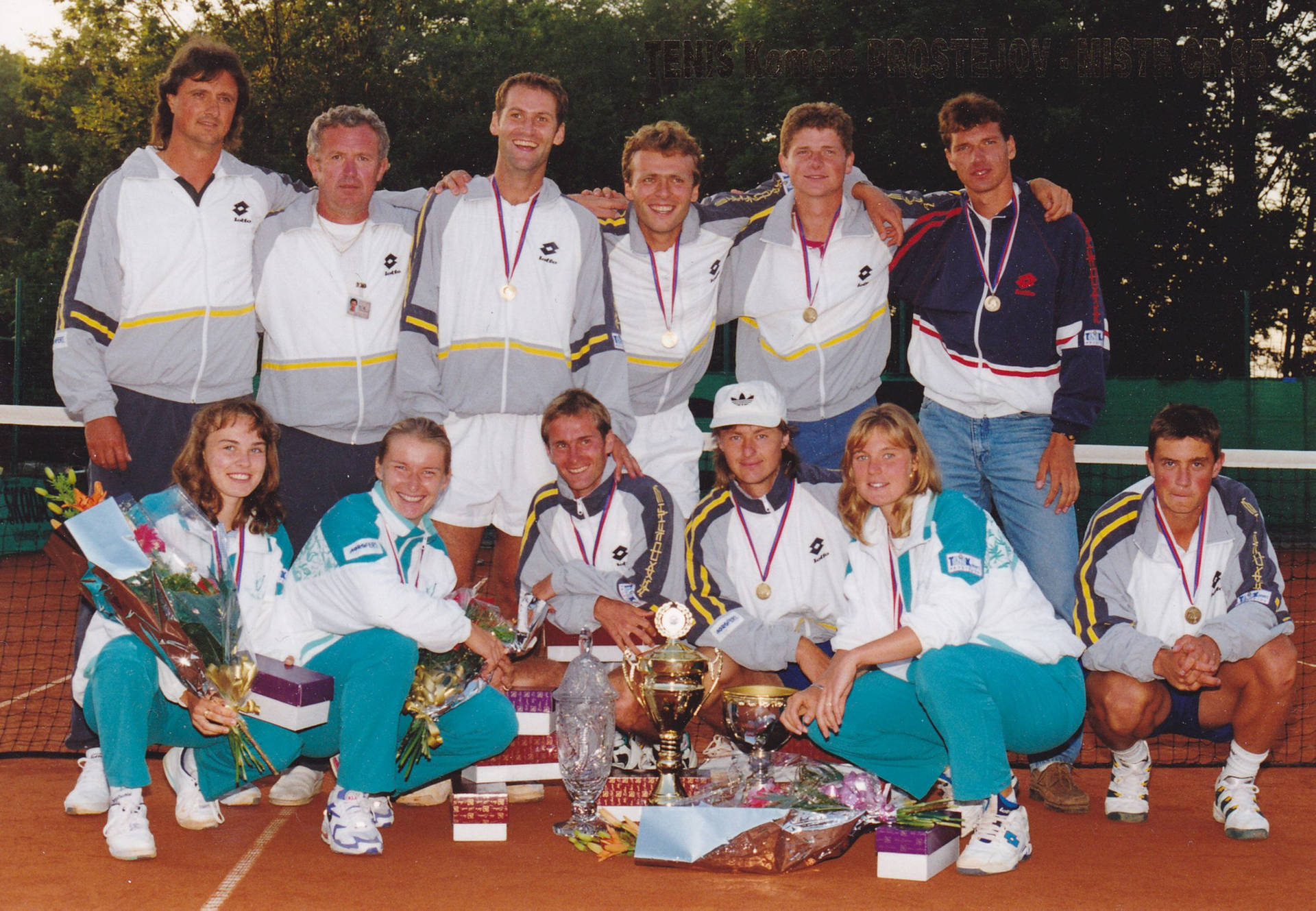 Jana Novotna Posing With Tennis Teammates Background