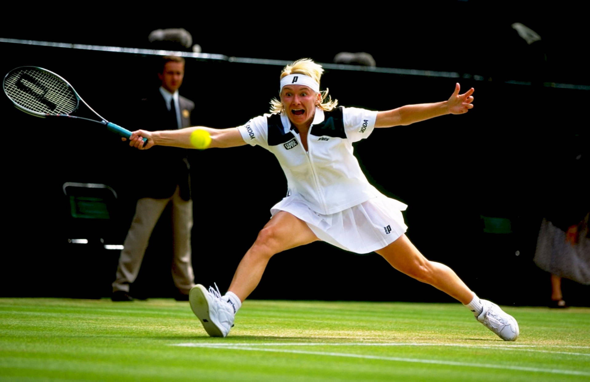 Jana Novotna Running To Hit Ball Background