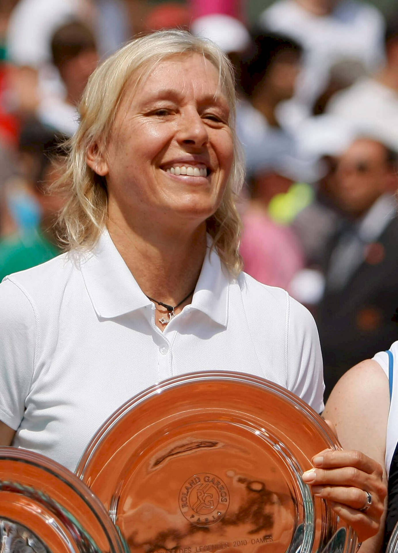 Jana Novotna Triumphantly Holding Tennis Trophy Background