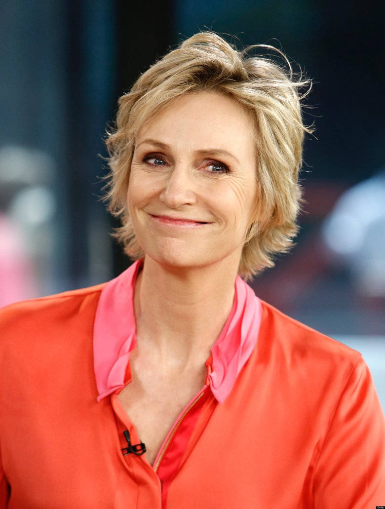 Jane Lynch Author Actor Comedian Orange Shirt Background