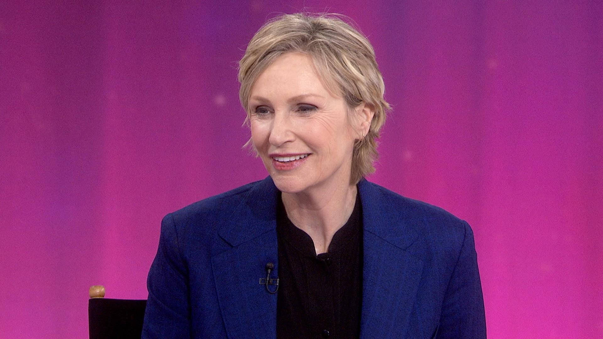 Jane Lynch Purple Background Talk Show