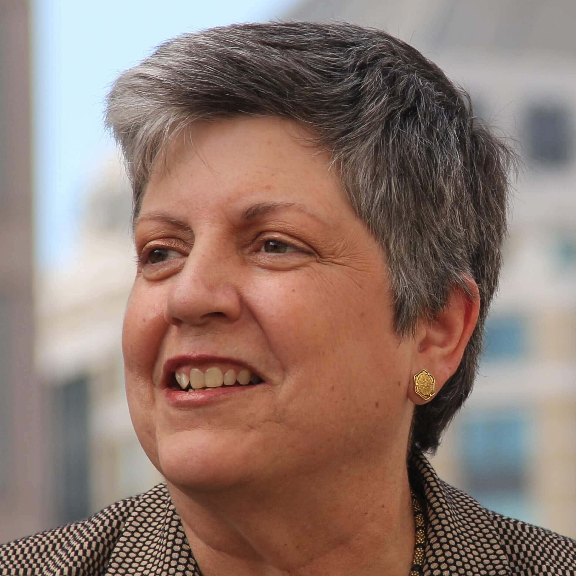 Janet Napolitano Elated Background