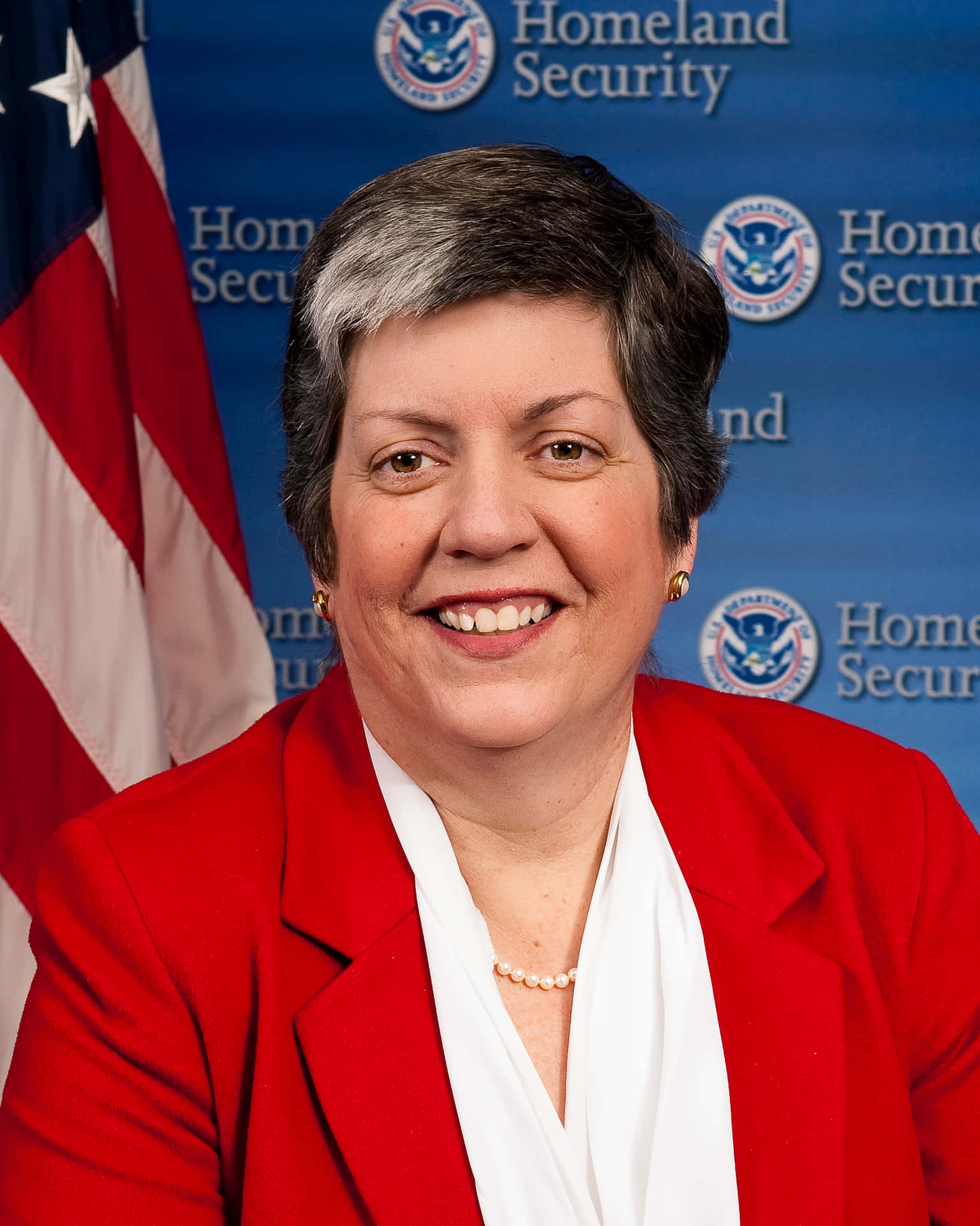 Janet Napolitano Grinning Background