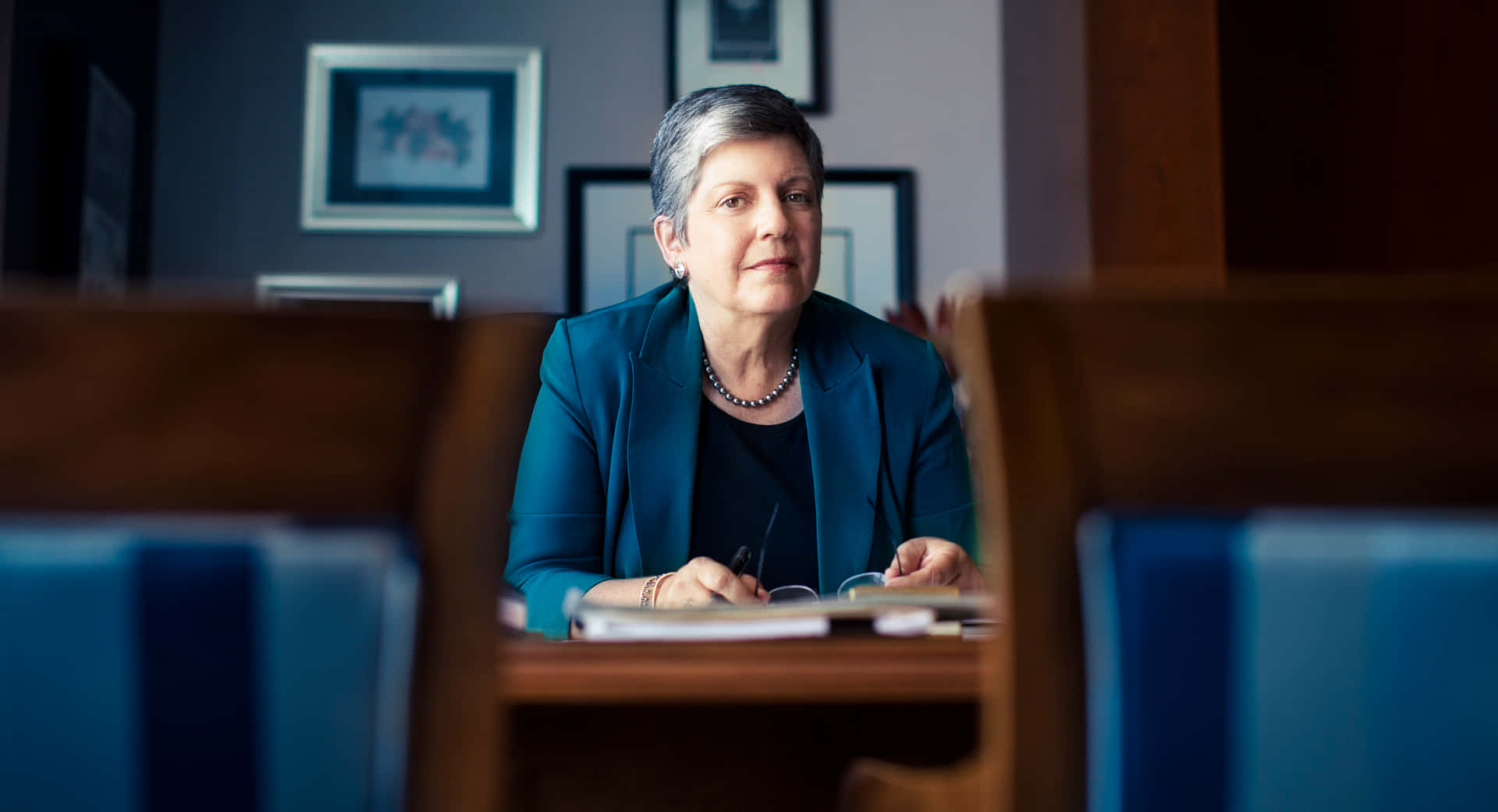 Janet Napolitano Looking At The Camera Background