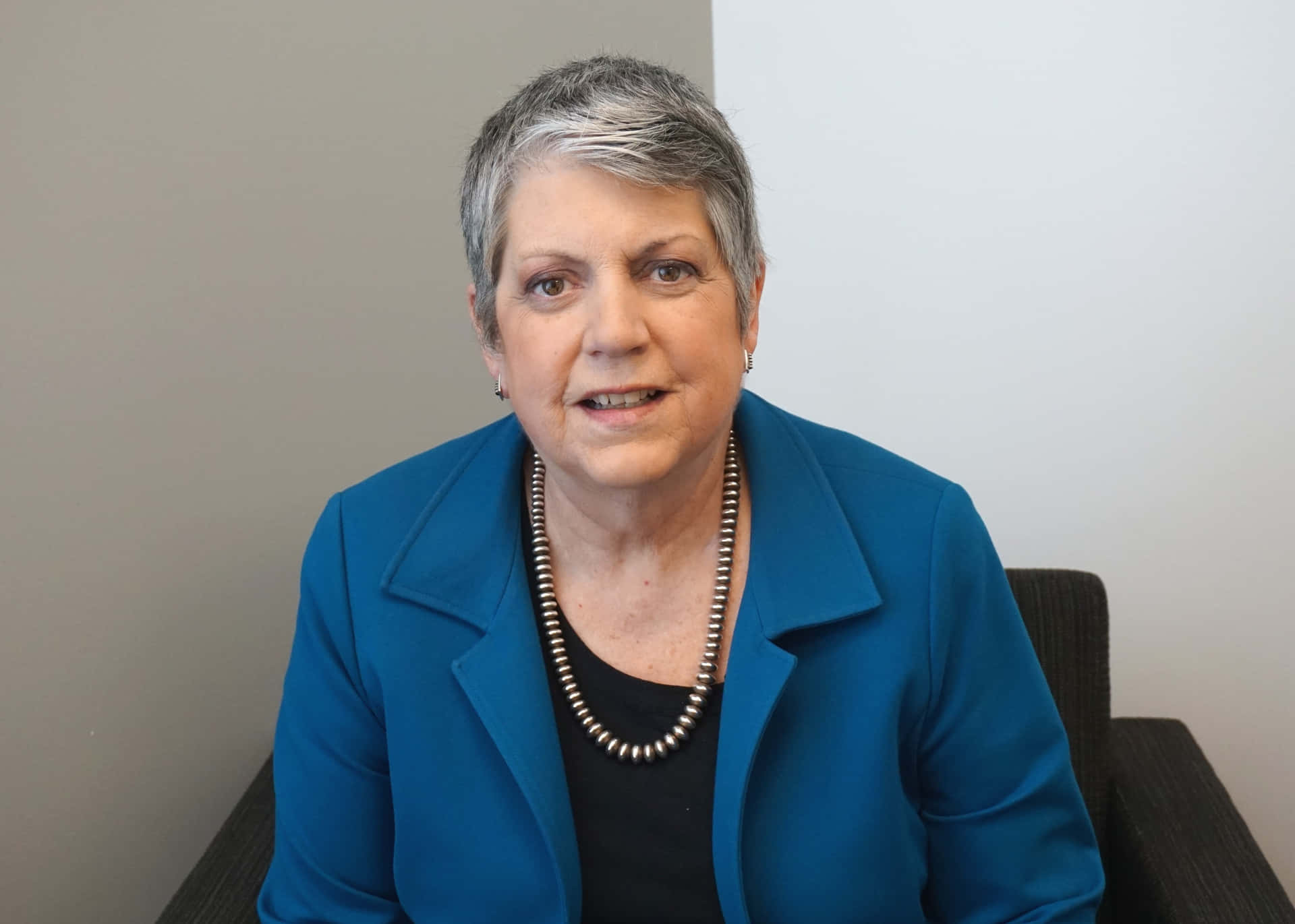 Janet Napolitano Posing Casually Background