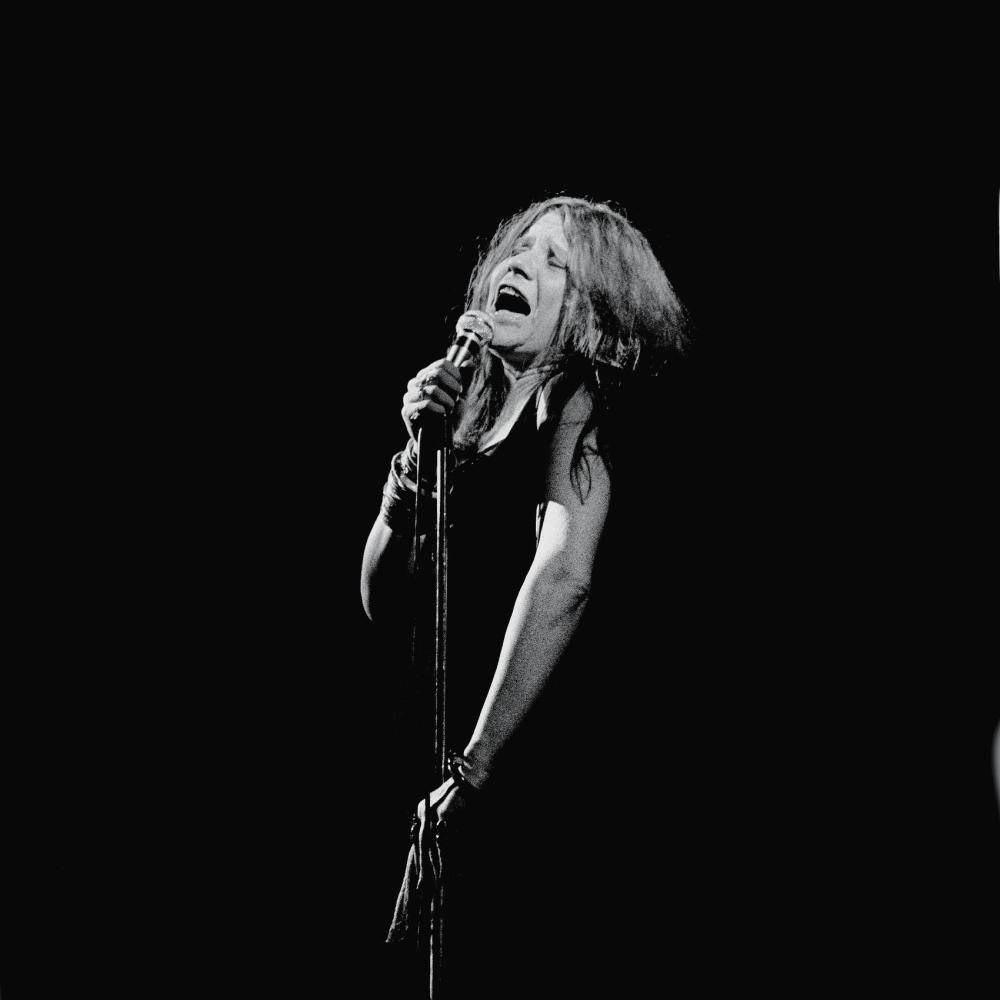 Janis Joplin Emotional On Stage Background