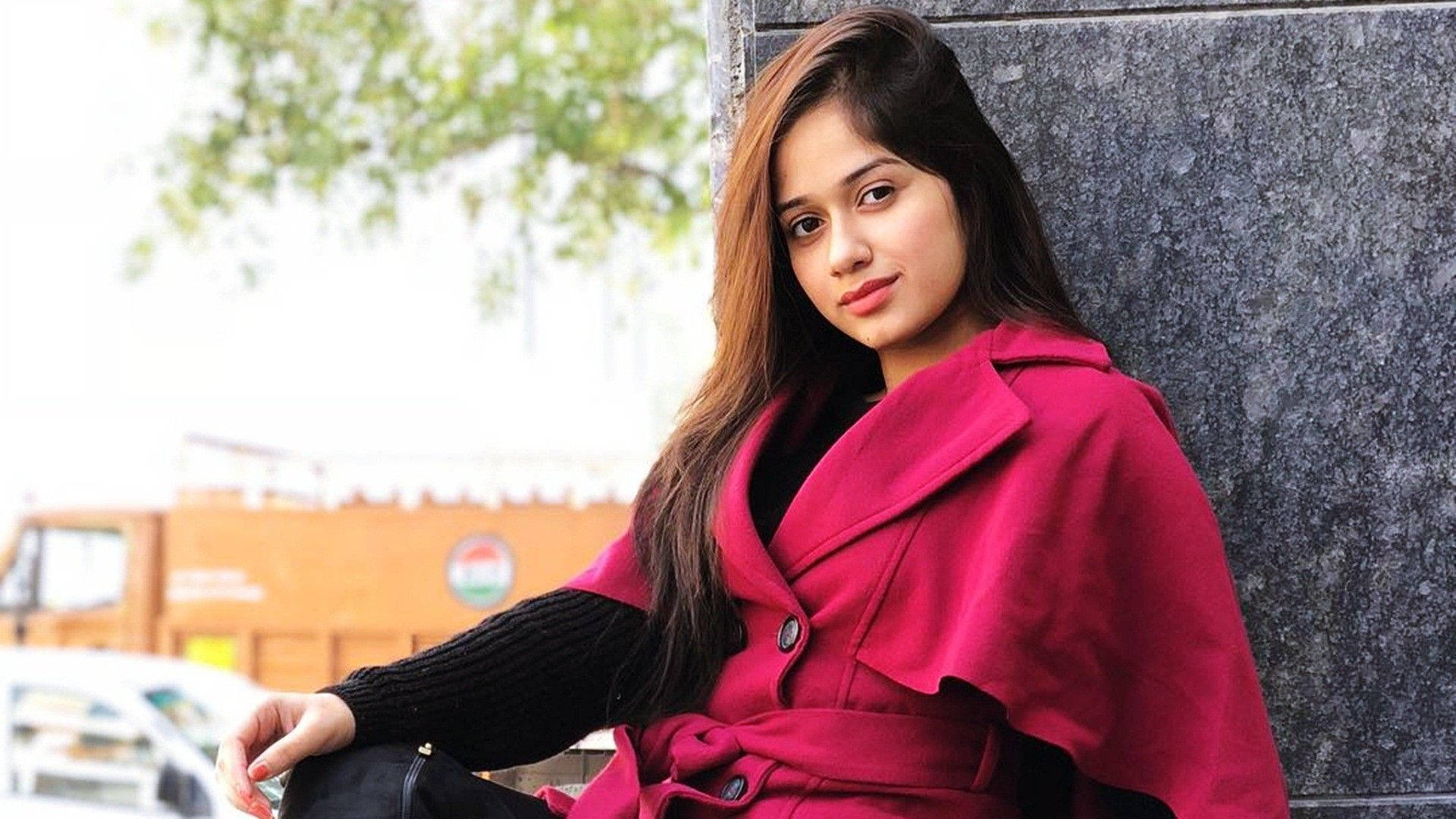 Jannat Zubair In Red Background