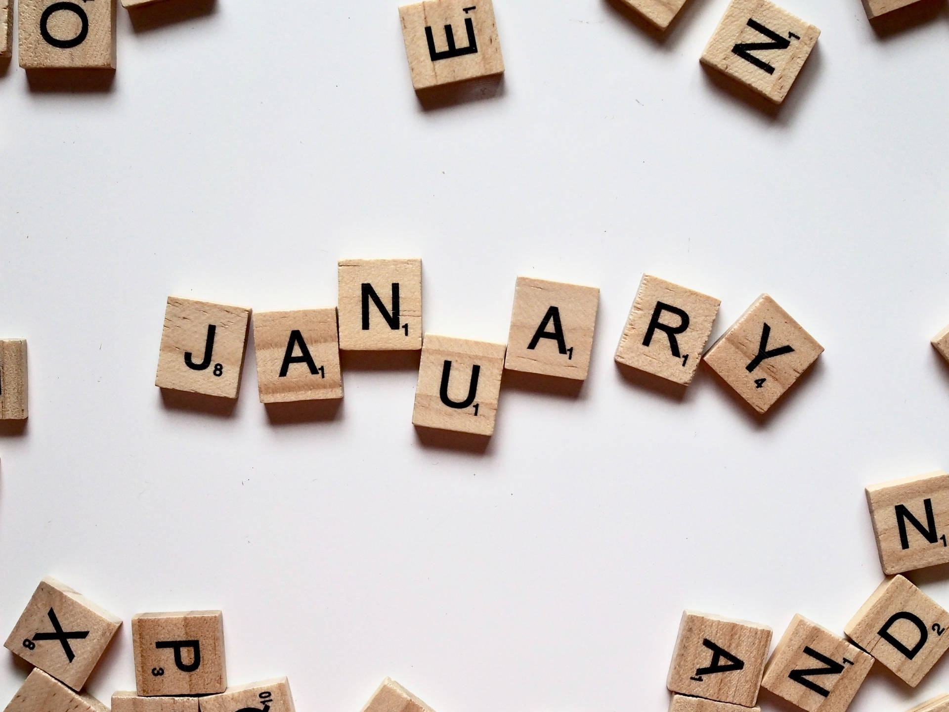 January Scrabble Letter Tiles Background