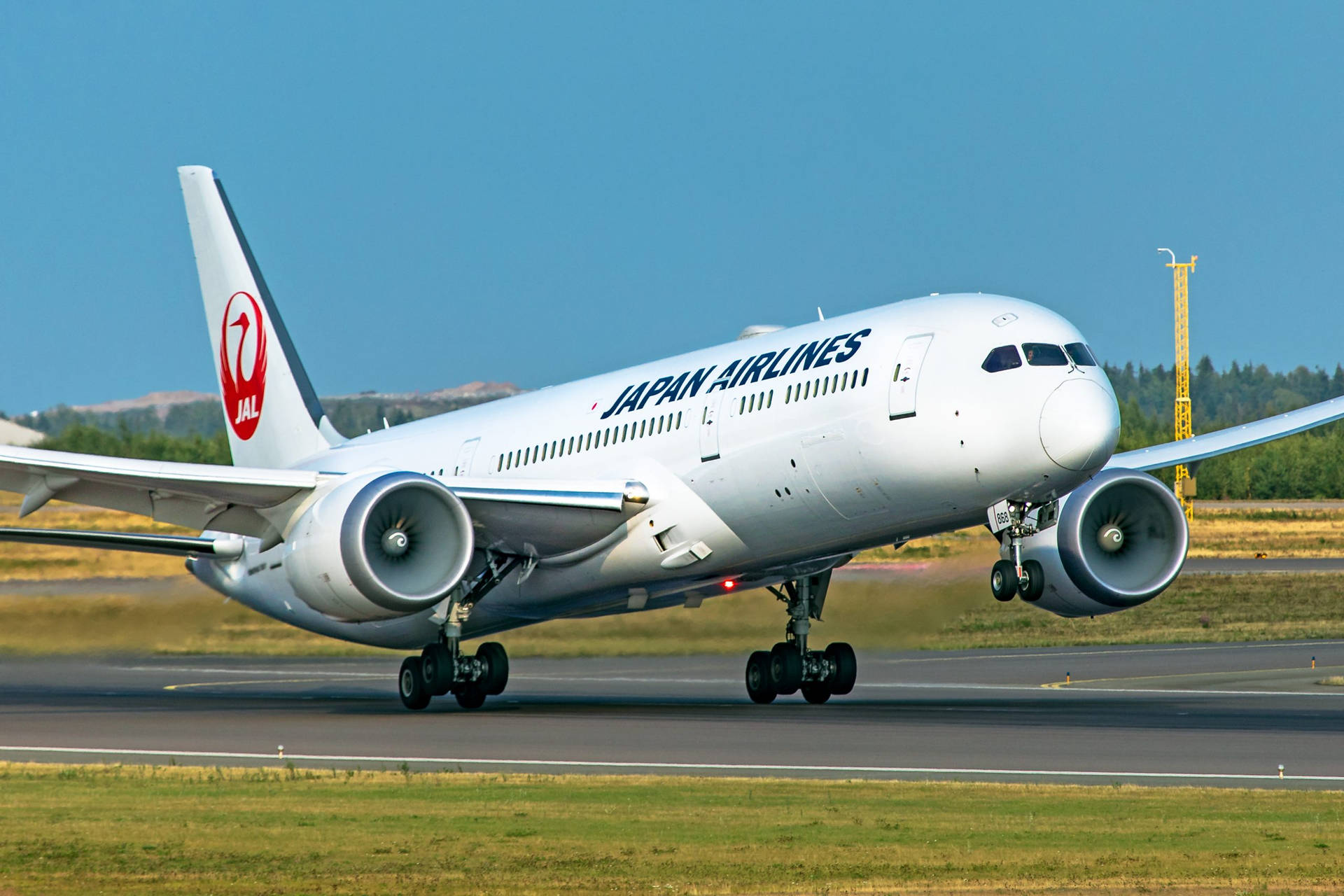 Japan Airlines Preparing Taxiway Background