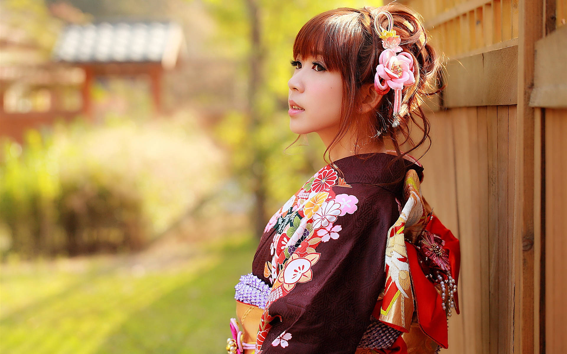 Japanese Girl By Wooden Fence