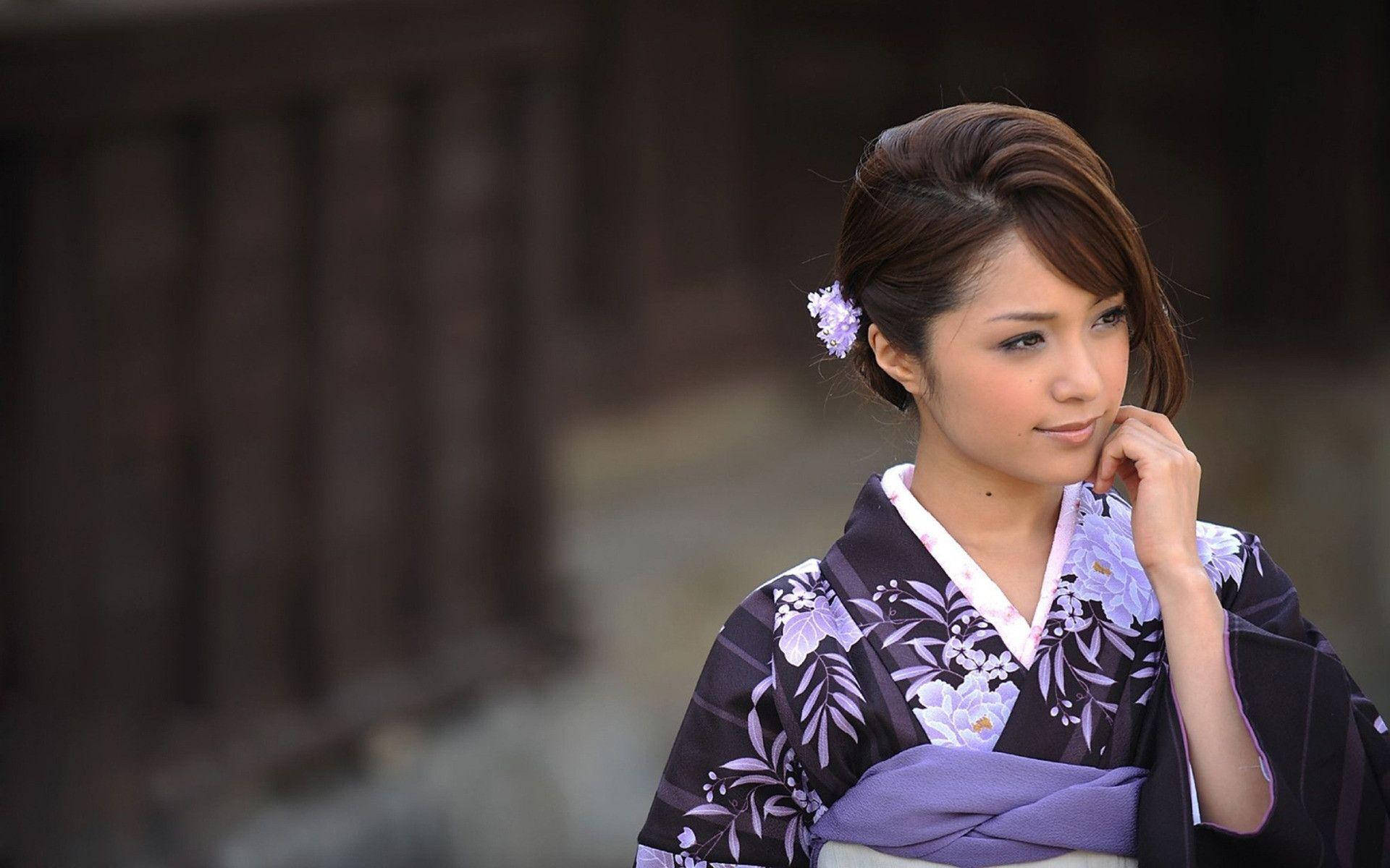 Japanese Girl In Violet Kimono