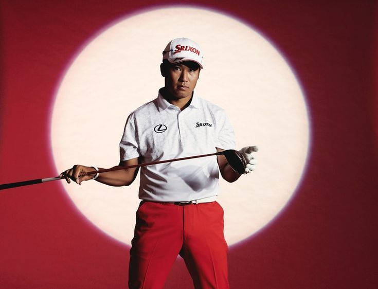 Japanese Golfer Hideki Matsuyama On Spotlight Background